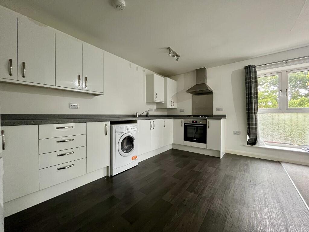 Kitchen and dining area in a Horrell Court apartment